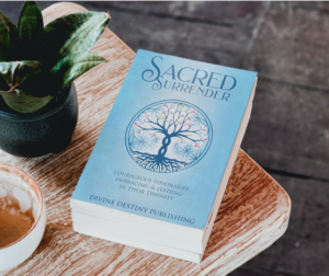Sacred Surrender Book on Table